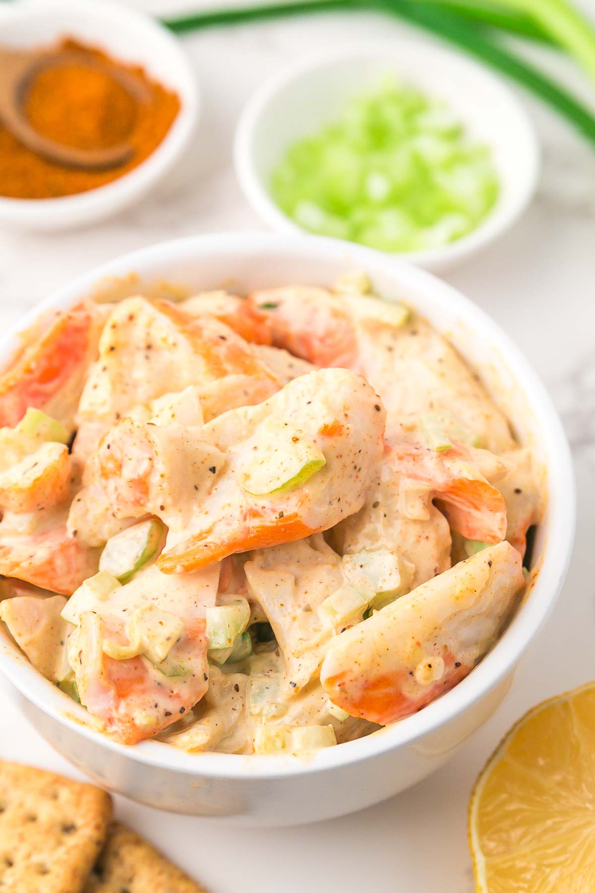 Creamy Crab Salad with Imitation Crab in a white bowl.
