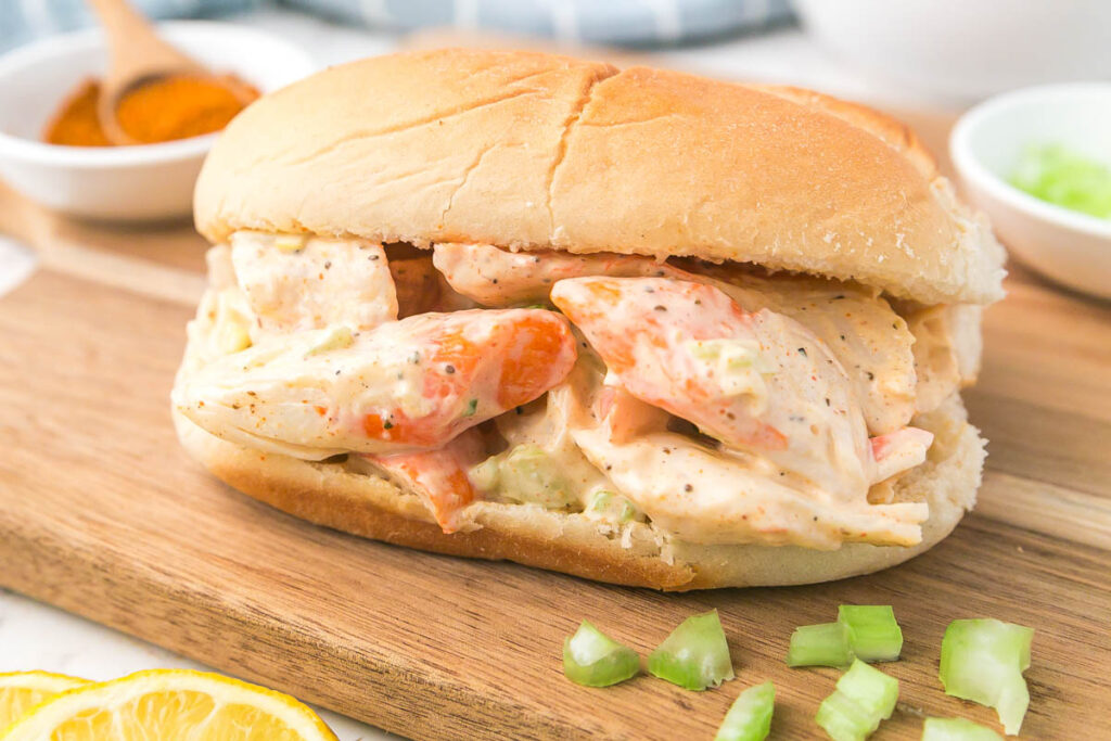 Creamy Crab Salad sandwich on a roll.