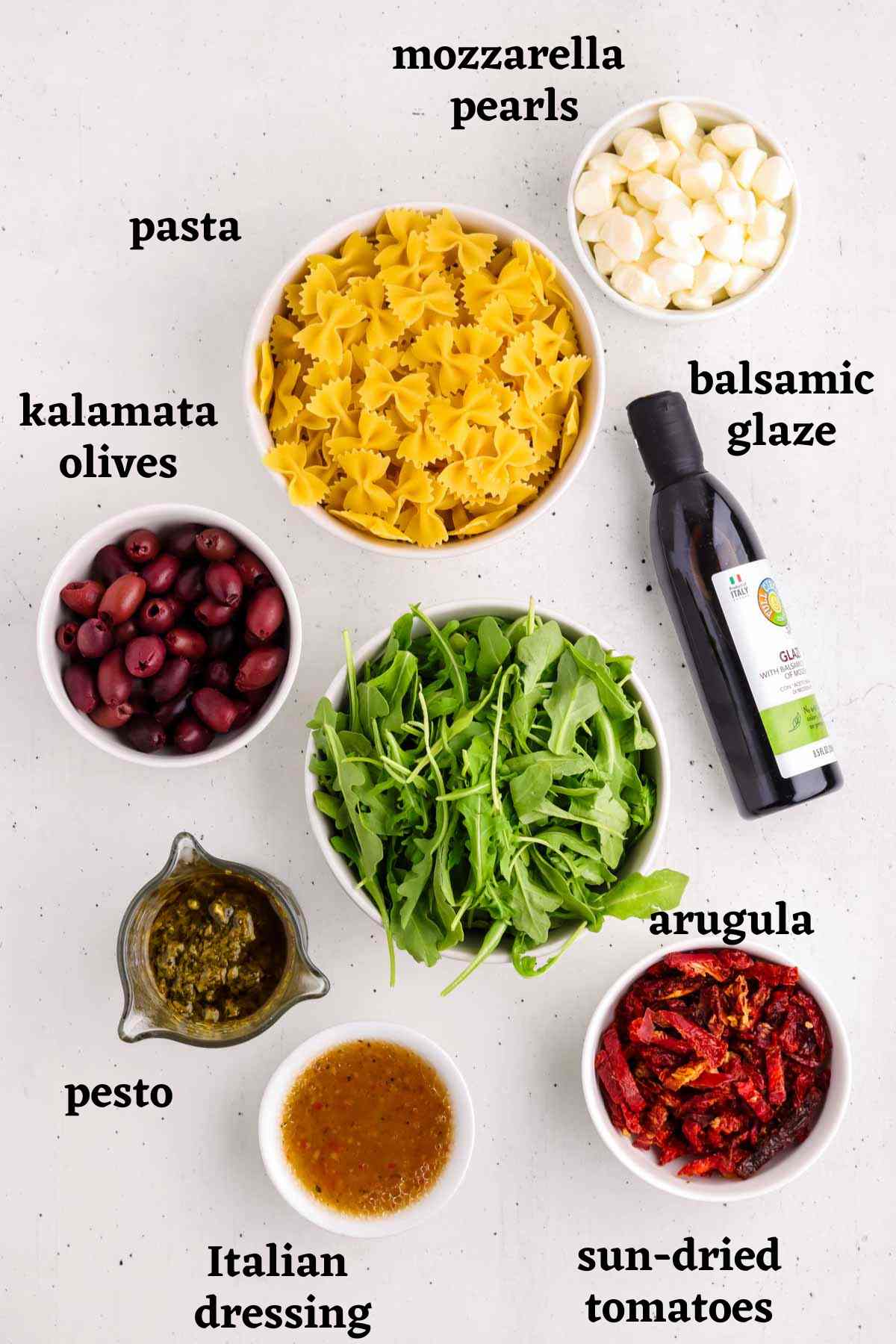 Ingredients needed to make a Christmas Pasta Salad.