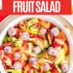 Pinterest pin for festive holiday fruit salad.